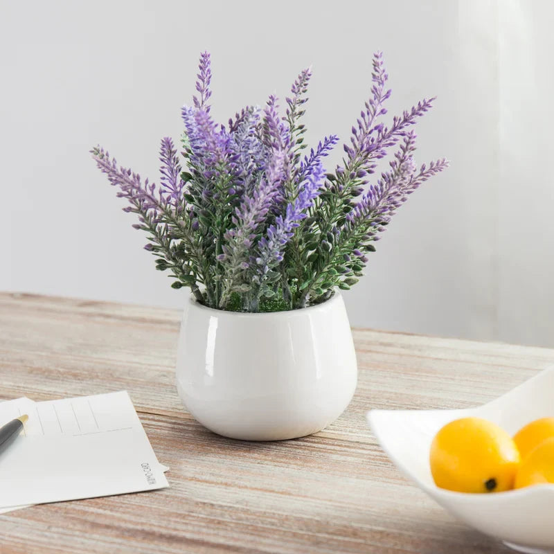 Faux Flowering Plant in Ceramic Pot